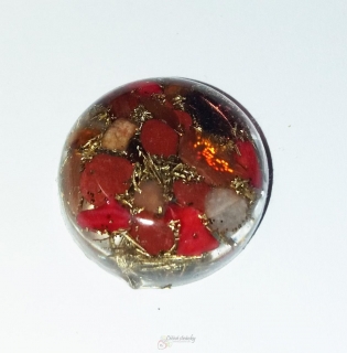 Orgon.placička s rudým paprskem světla